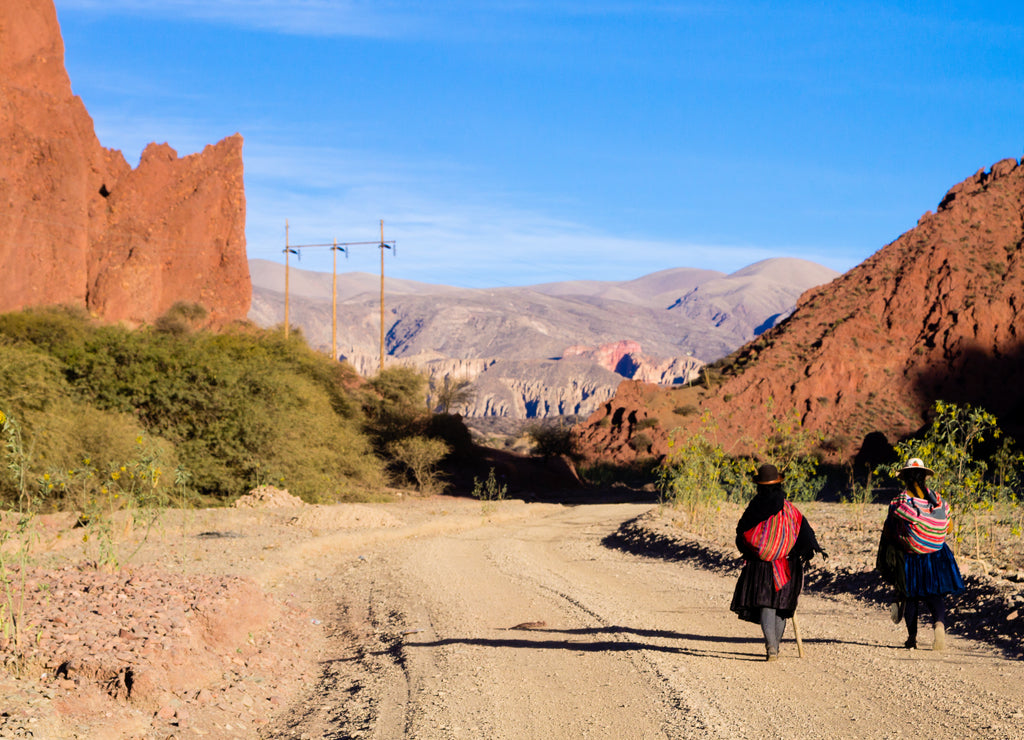 Bolivian people along dirt road,Bolivia