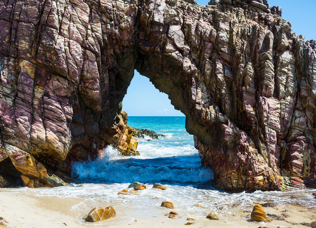 Pedra Furada, stone natural gates on the beach, Jericoacoara, Brazil
