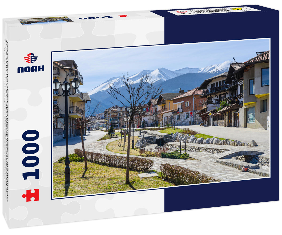 Gotse Delchev street and promenade in the mountain town of Bansko, now the largest mountain resort in Bulgaria. In the background the Pirin mountains