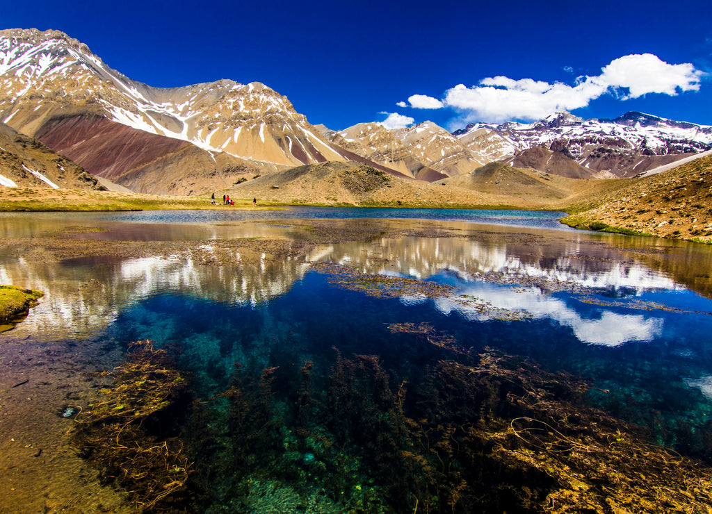 Los Patos Lagoon at Central Andes mountain range an amazing representation of the typical andean landscape at Santiago de Chile with amazing views over the southern 6,000m mountain Cerro Marmolejo