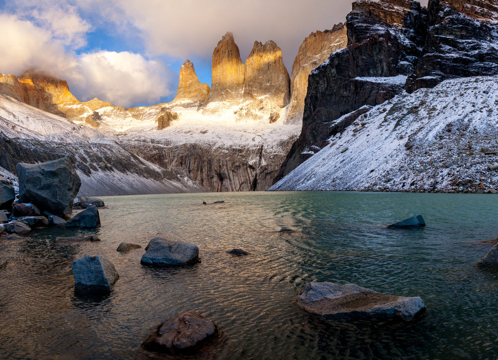 Sunrise over the three Peaks forming the Torres del paine, Patagonia, Chile
