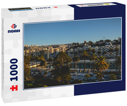 Day evening view of the skyline of the hills of Valparaiso and Viña del Mar with beautiful sunset light and Marga Marga river, Chile