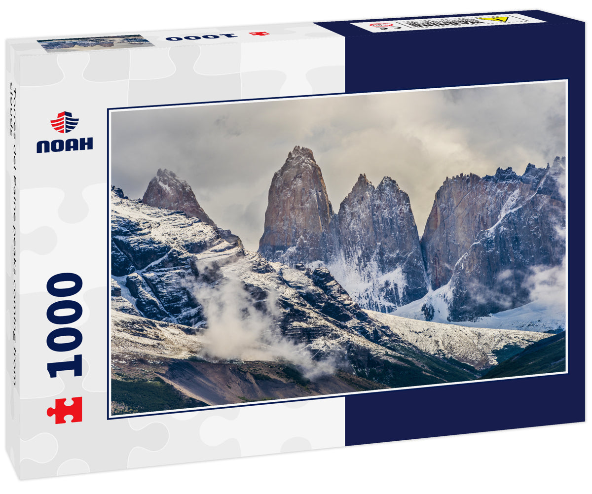 Torres del Paine peaks coming from clouds