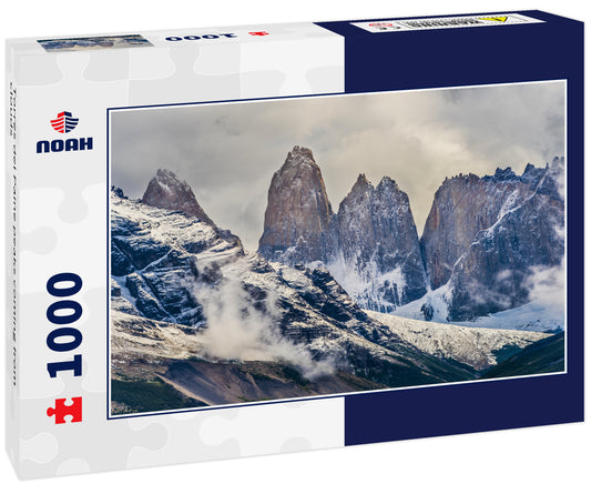 Torres del Paine peaks coming from clouds