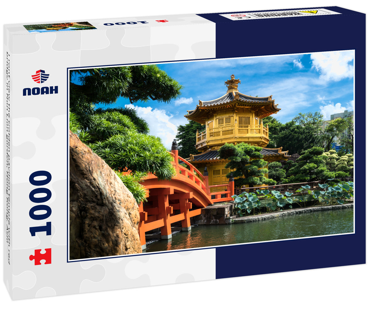 Front view the Golden pavilion temple with red bridge in Nan Lian garden, Hong Kong. Asia