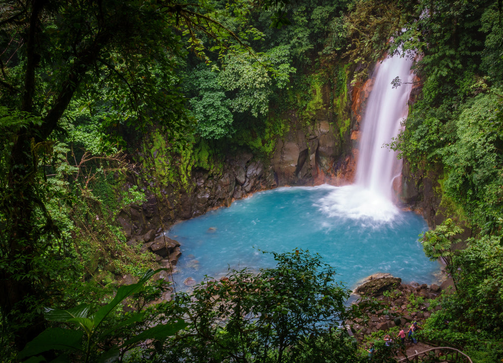 Celestial blue waterfall in volcan tenorio national park Costa Rica