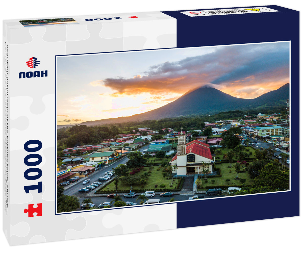 Beautiful aerial view of the Fortuna town, church, park and the Arenal volcano at sunset in Costa Rica