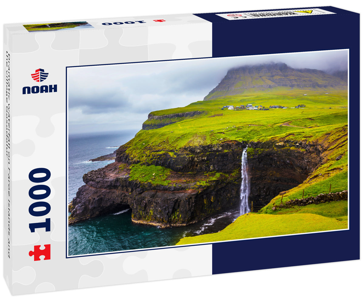 Dramatic waterfall on Faroe Islands and the village Gasadalur