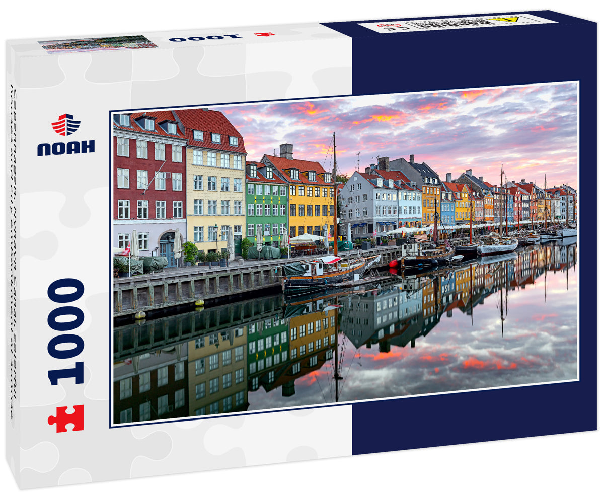 Copenhagen. Nyhavn Canal, colorful houses and city embankment at sunrise