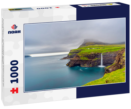 Gasadalur waterfall long exposure in Faroe Islands, misty day