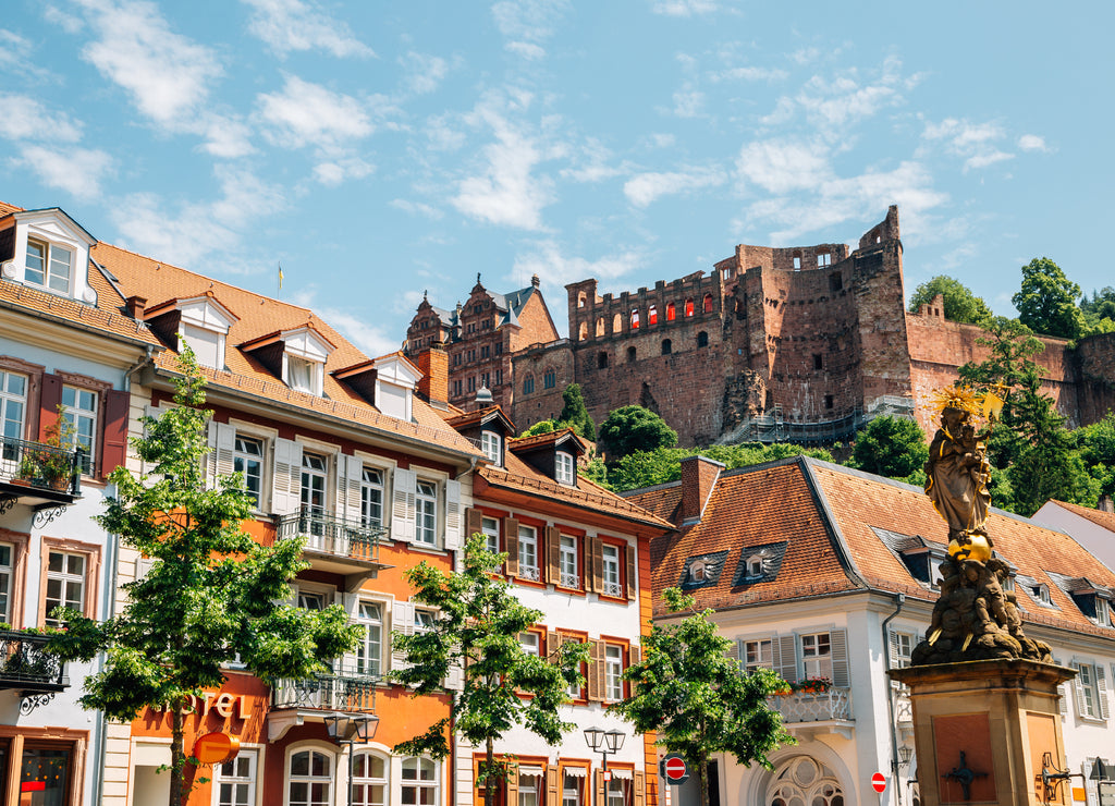 Old town Kornmarkt square and Heidelberg castle in Heidelberg, Germany