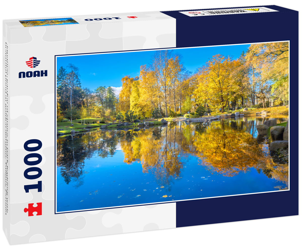 Japanese garden of stones in park Kadriorg with beautiful pond at golden autumn. Tallinn, Estonia