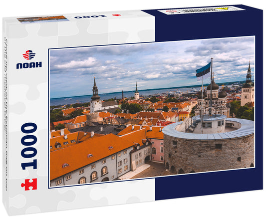 Close up view of the Estonian flag on top of the old medieval tower