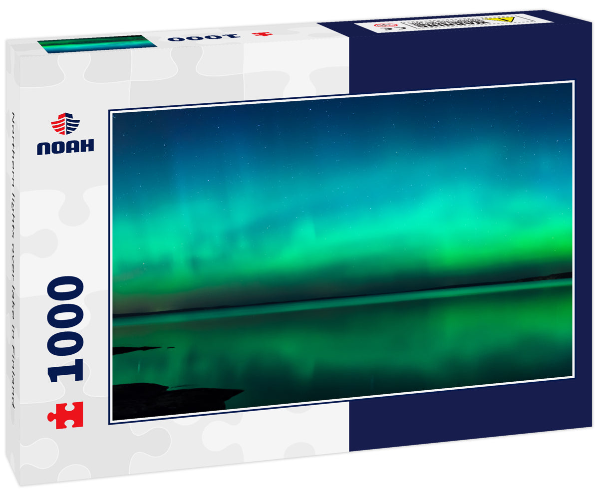 Northern lights over lake in Finland