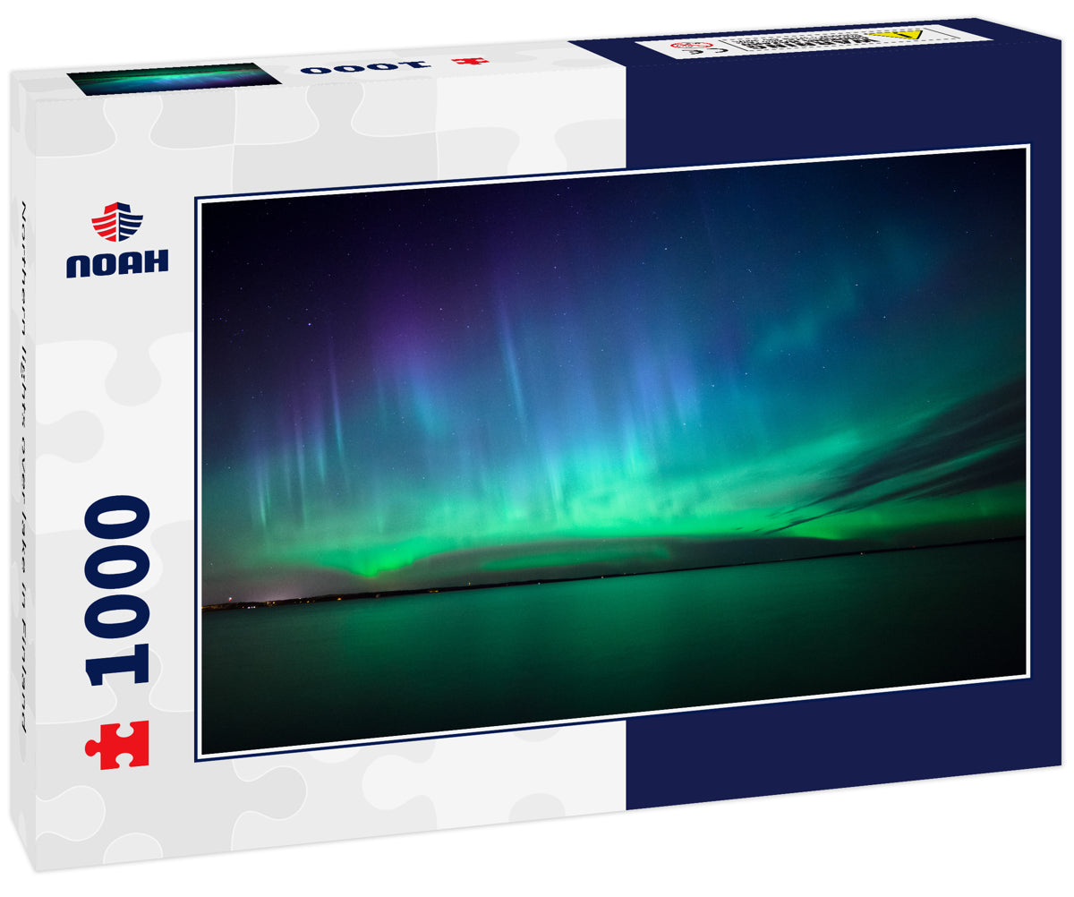 Northern lights over lake in Finland