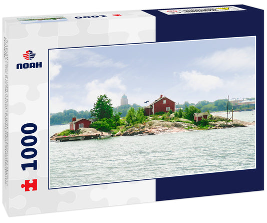 A small island with a house with the Helsinki skyline visible in the background. Taken near Suomenlinna, Finland