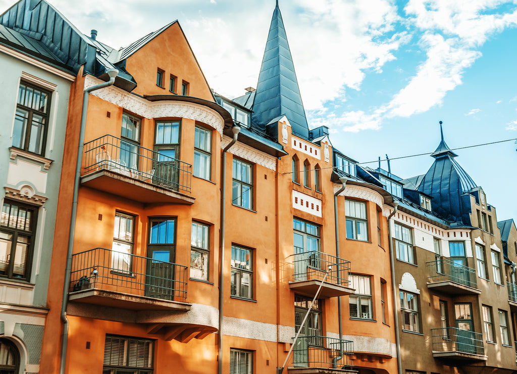Multicolored facades of buildings in Helsinki, the capital of Finland, the traditional Scandinavian architecture, Ullanlinna, Huvilakatu