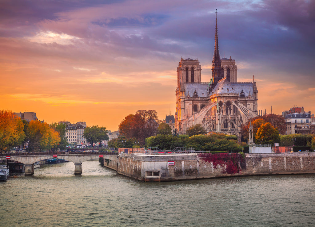 Paris. Cityscape image of Paris, France with the Notre Dame Cathedral during sunset