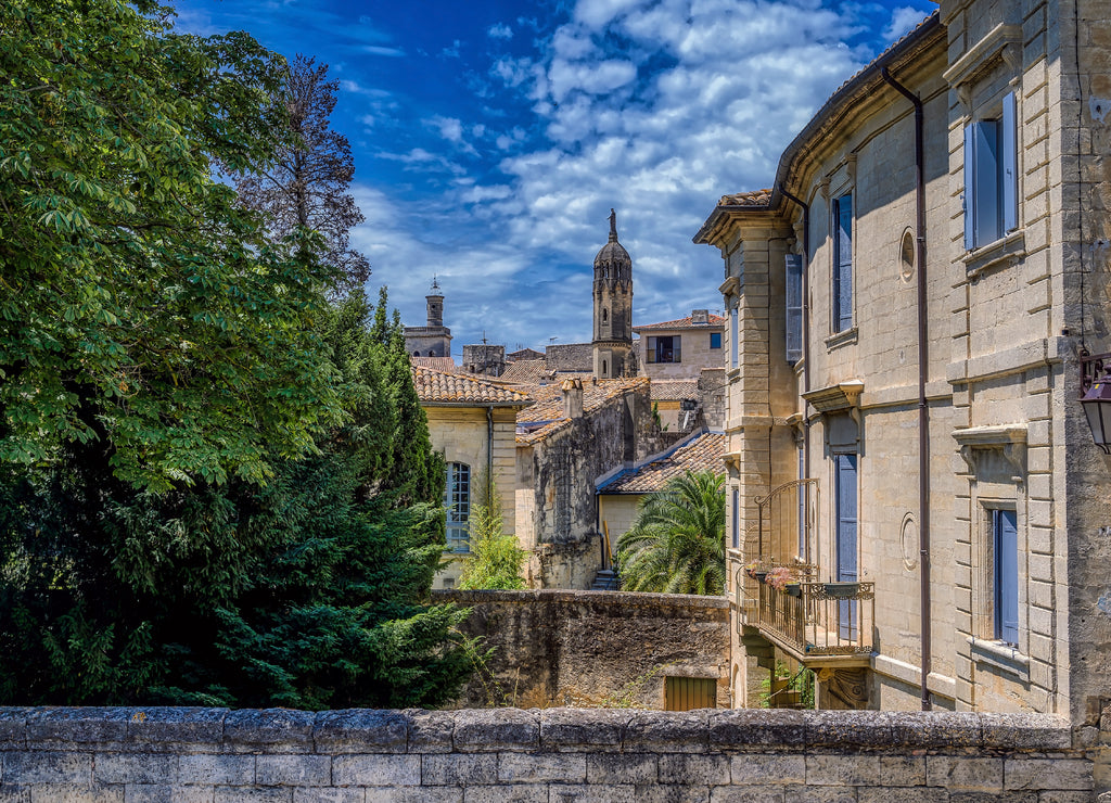 Old medieval stone buildings in the city of Uzes, in the Gard Department of France