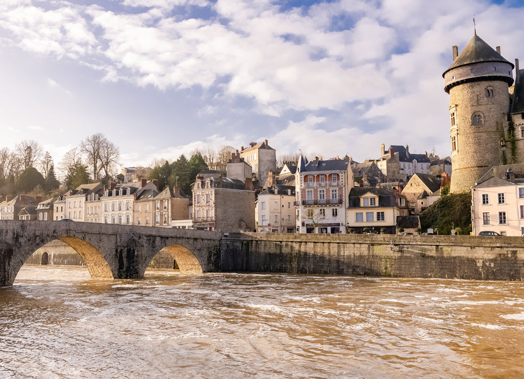 Laval, beautiful french city, panorama of the river and typical houses in the ancient center, downtown under the floods, the river in flood