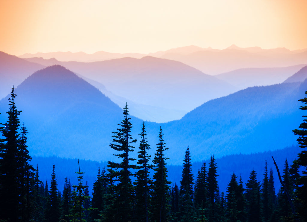 Hazy scenic view of mountain ranges in Mt. Rainier National Park, Washington