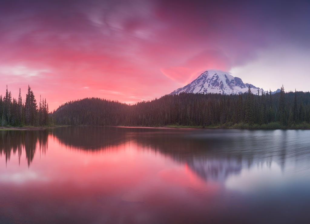 Mount Rainier National Park in the Cascade Range, Washington State, USA. A beautiful active volcano at sunset in North America. Summer time
