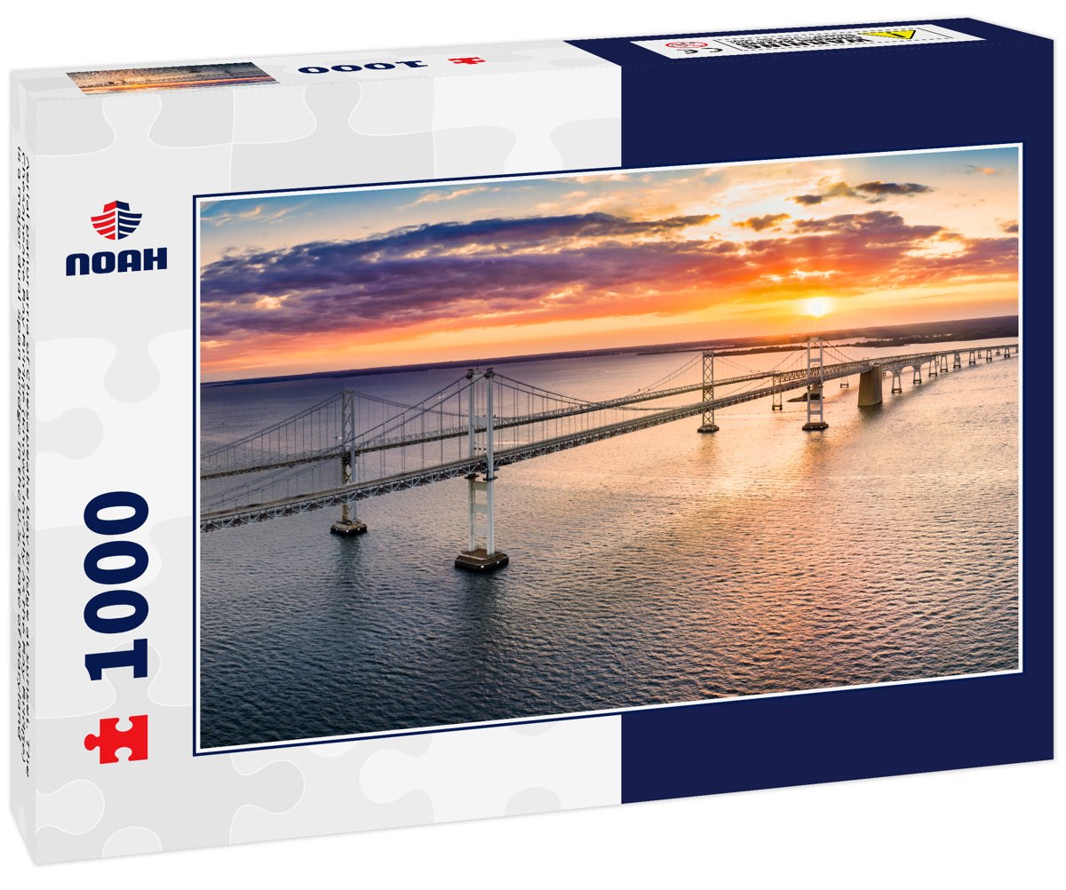 Aerial panorama of Chesapeake Bay Bridge at sunset. The Chesapeake Bay Bridge (known locally as the Bay Bridge) is a major dual-span bridge in the U.S. state of Maryland