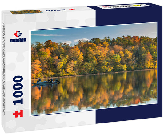 reflection of vibrant colorful peak autumn foliage of trees in the serene Lake Habeeb in Rocky Gap State Park in Western Maryland Allegany county