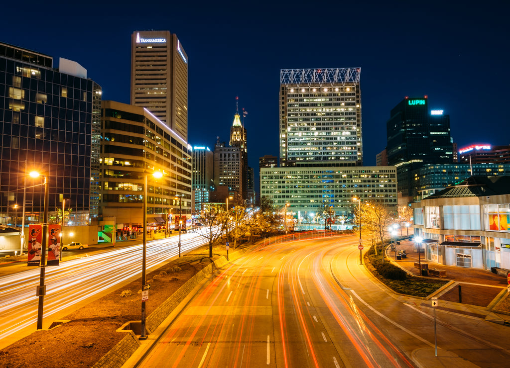 Light Street and the skyline of downtown at night, in Baltimore, Maryland