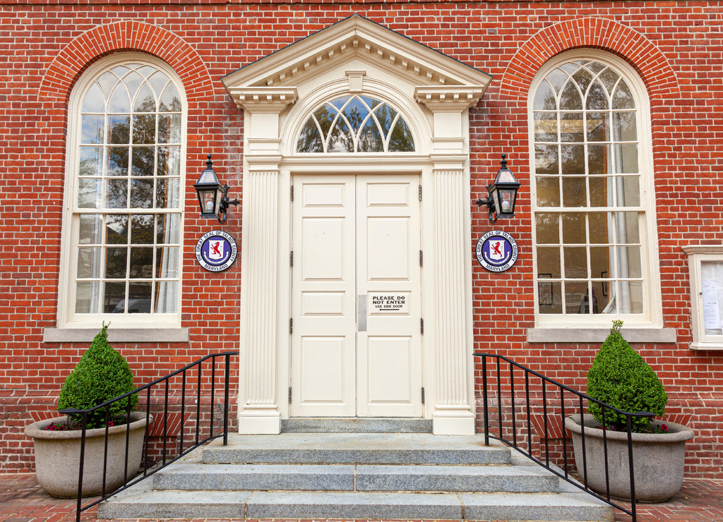 Easton, Maryland: historic Courthouse building is among the oldest landmarks in the beautiful small town of Easton. Brick building has Talbot County Seals on both side of the entrance door