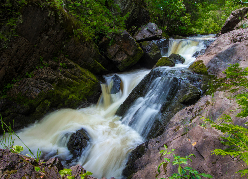 Wisconsin Waterfall. Long Slide Falls is one of several waterfalls in Marinette County Wisconsin. Marinette is also dubbed the waterfall capitol of Wisconsin