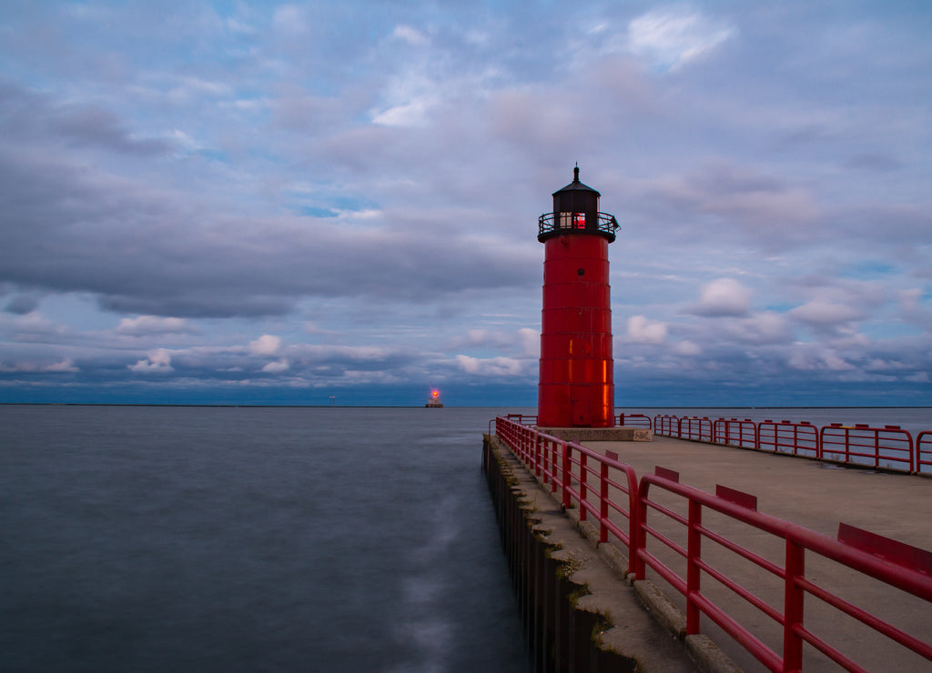 The "Milwaukee Pier Head Lighthouse" as the sun sets and the rain passes. Milwaukee, Wisconsin, USA
