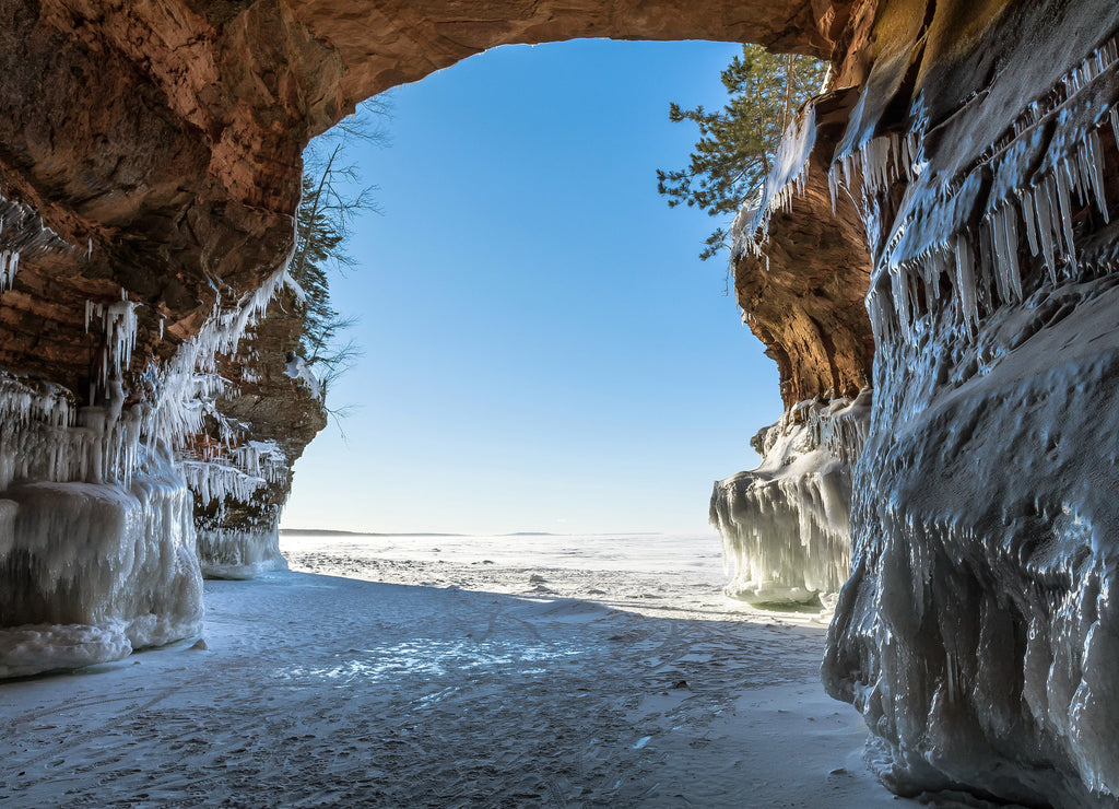 Icicle and snow-laden shoreline sandstone formations on Wisconsin's Apostle Islands National Lakeshore near Meyer's beach; Lake Superior