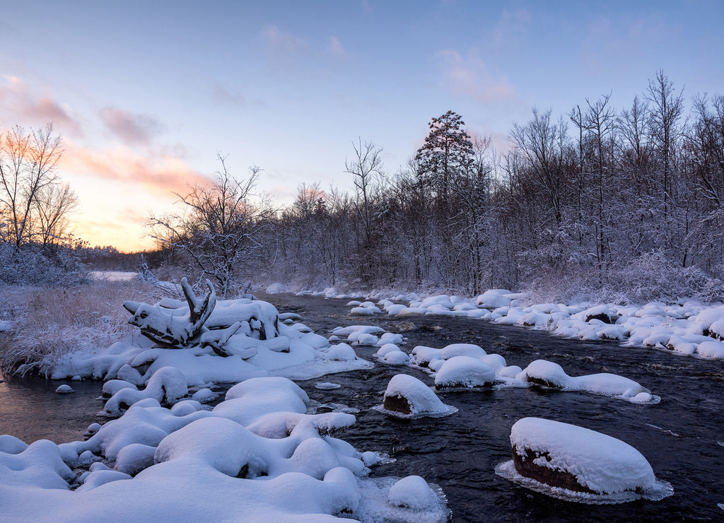 Sunset over the snow-blanketed West fork of the Chippewa River in northern Wisconsin