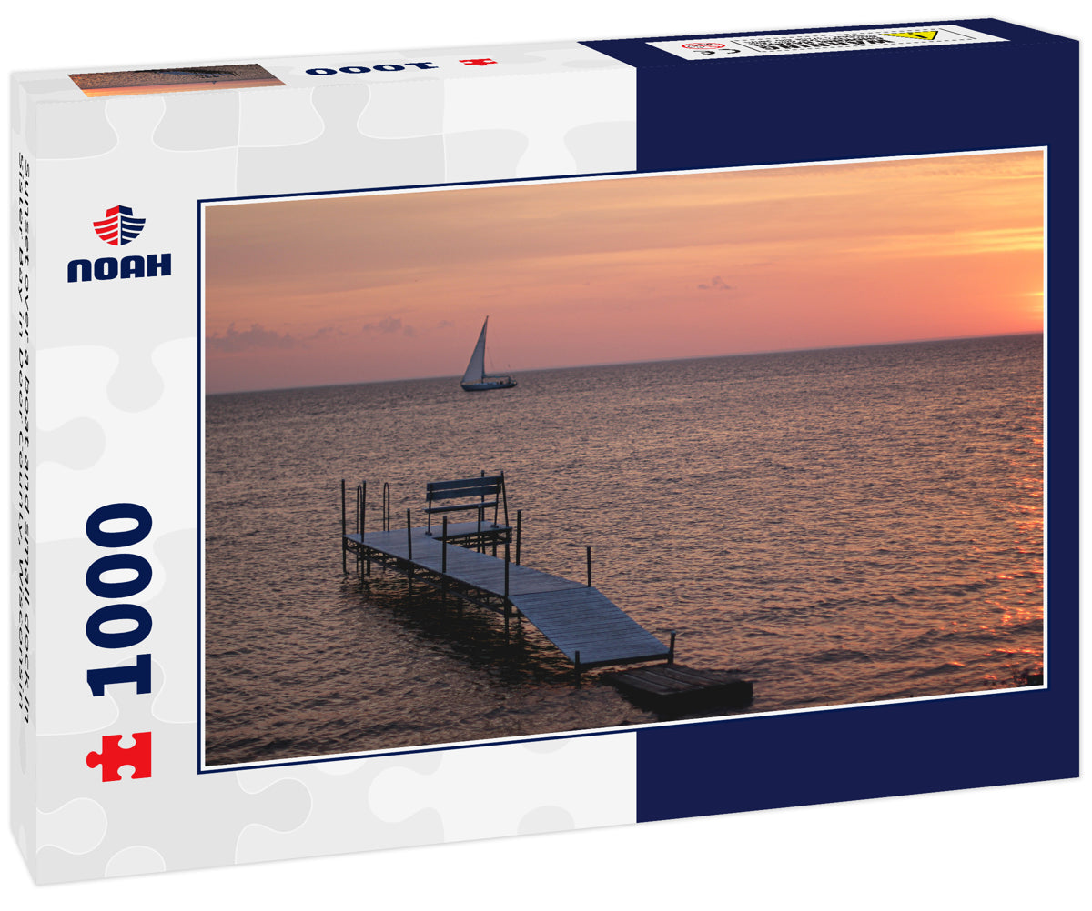 Sunset over a boat and small dock in Sister Bay in Door County, Wisconsin