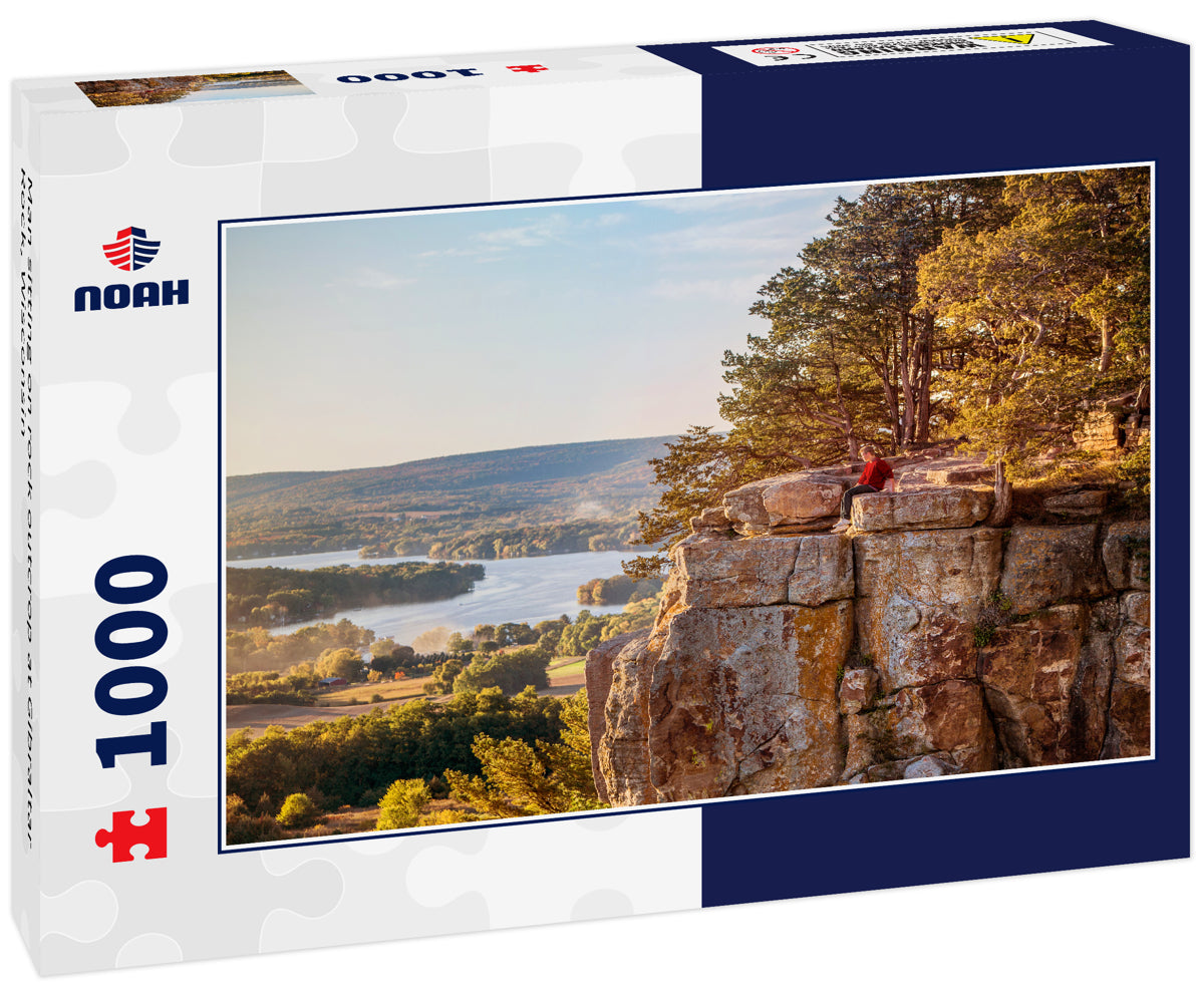 Man sitting on rock outcrop at Gibraltar Rock, Wisconsin