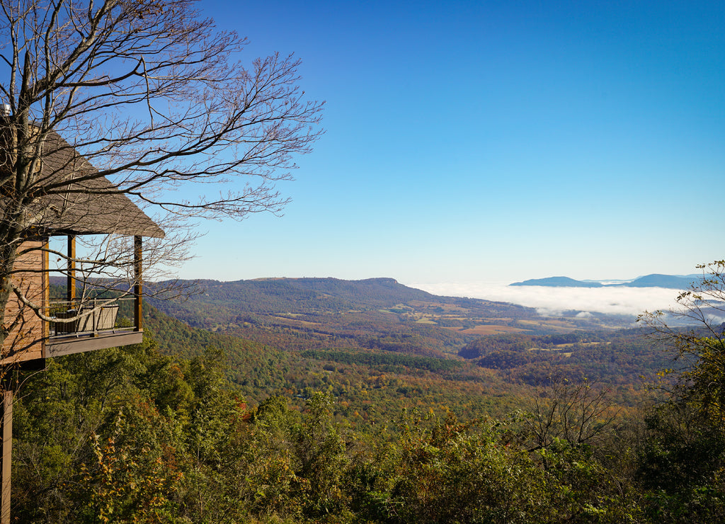 House overlooking landscape along scenic route 7 byway in Arkansas during autumn