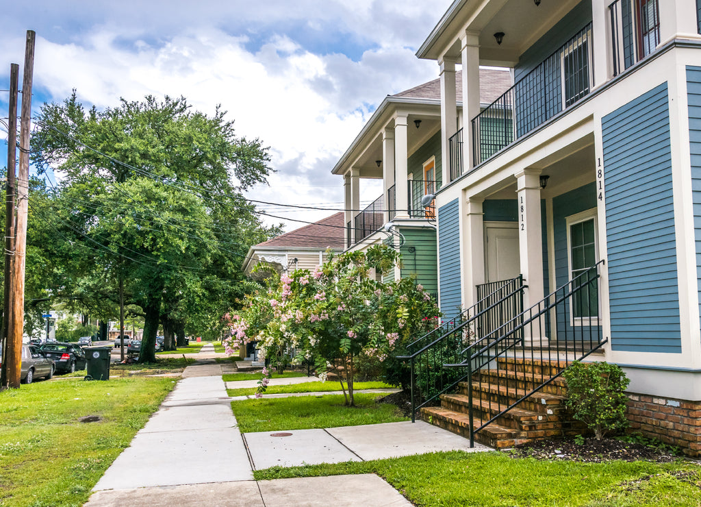Old wooden houses in colonial style. Streets of New Orleans after a warm summer rain, Louisiana