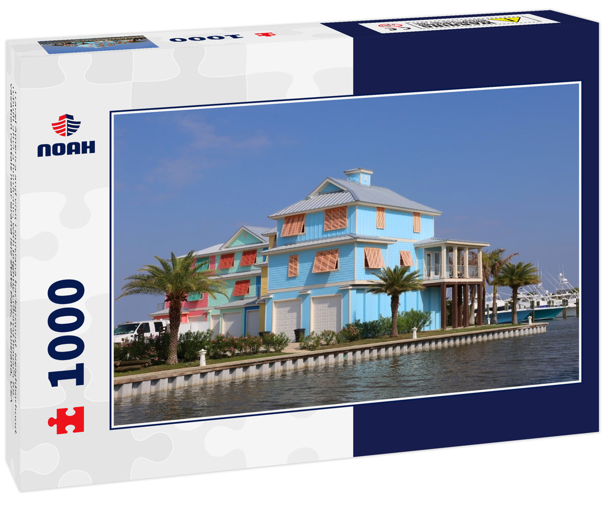 Travel America and visit Louisiana background. Neighborhood, rebuilt after a hurricane, with brightly colored houses for vacation rentals near Grand Isle State Park, Louisiana, USA