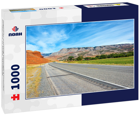 Highway passing through a colorful landscape in Shell, Wyoming