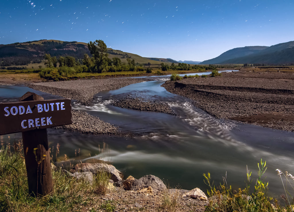 Yellowstone Park Wyoming soda butte creek at night under full moon