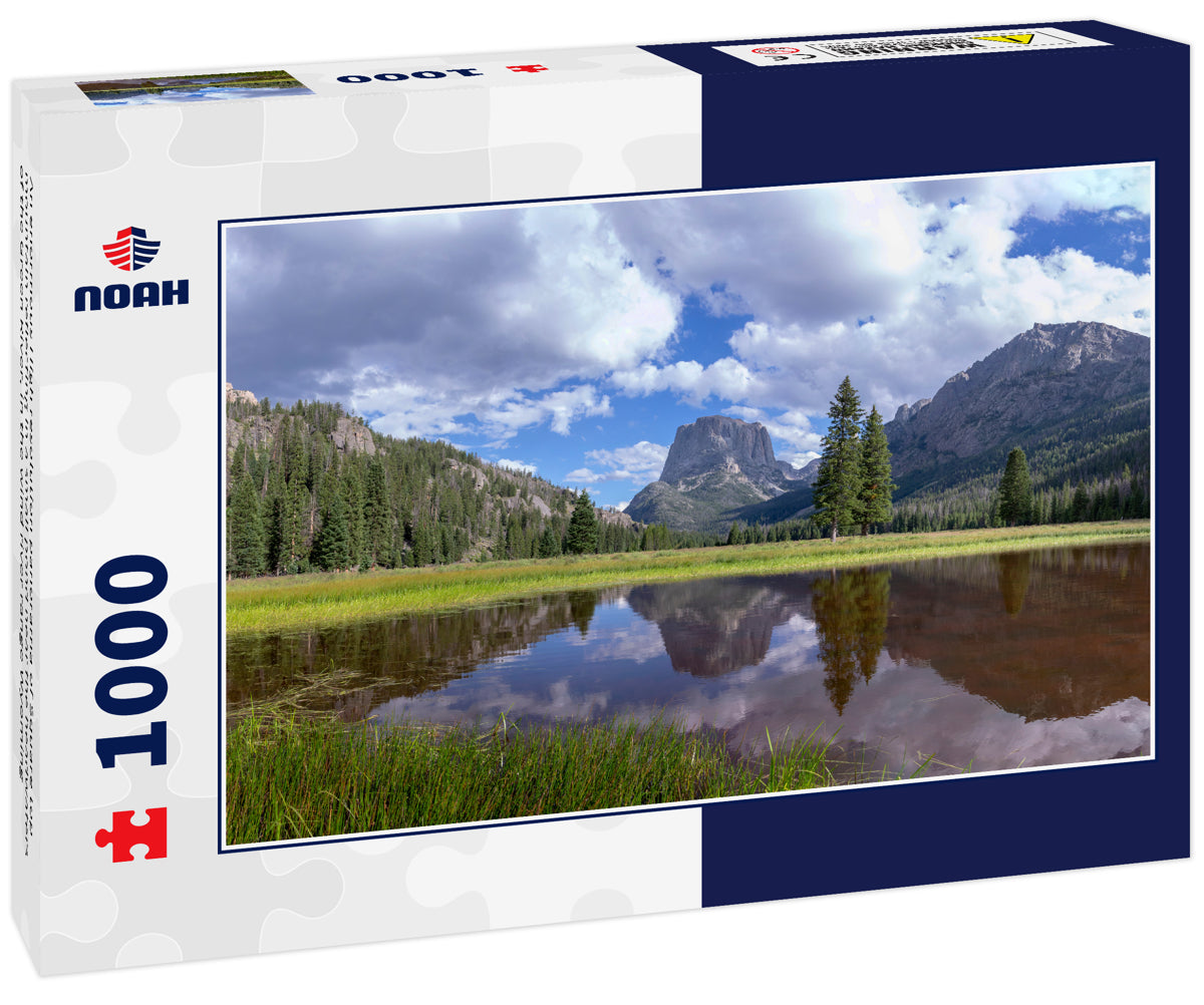 An enormous High resolution panorama of Square top mountain reflecting in a small pond near the headwaters of the Green River, in the wind river range Wyoming