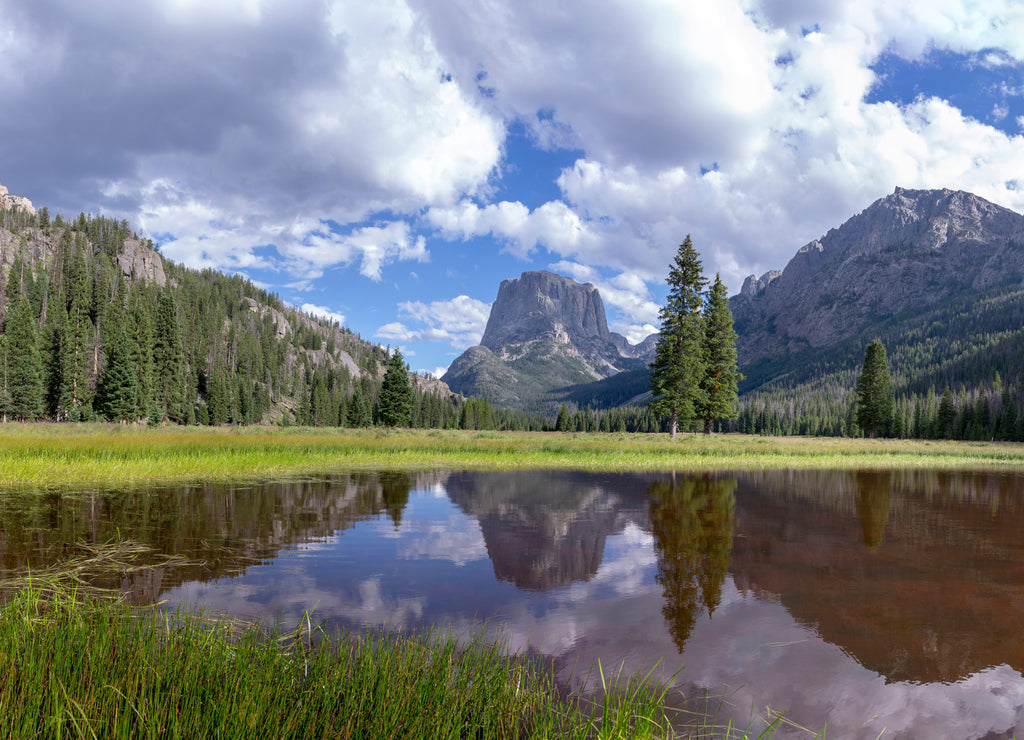 An enormous High resolution panorama of Square top mountain reflecting in a small pond near the headwaters of the Green River, in the wind river range Wyoming