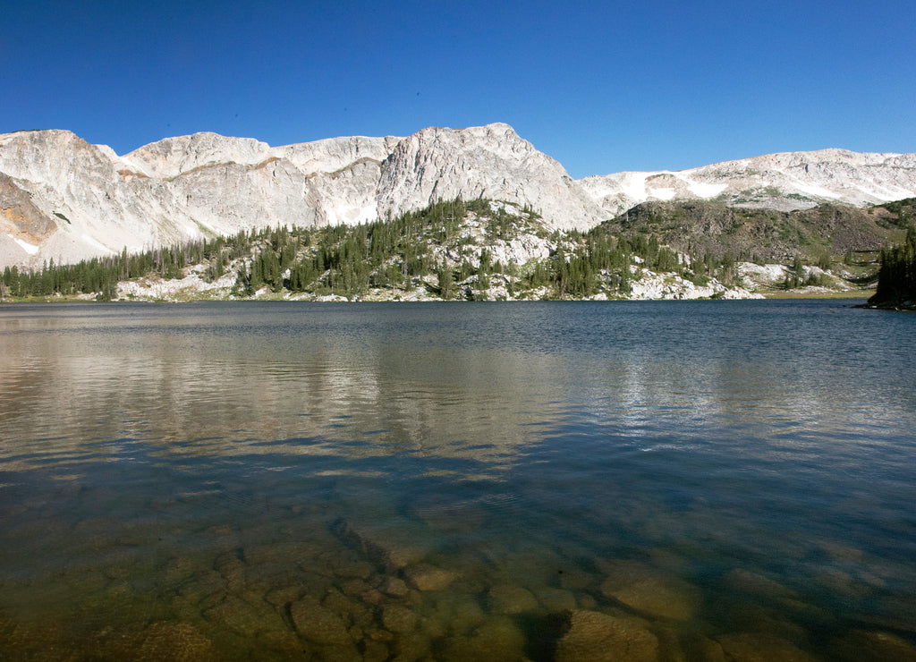 mountain reflection in lake in snowy range medicine bow Wyoming