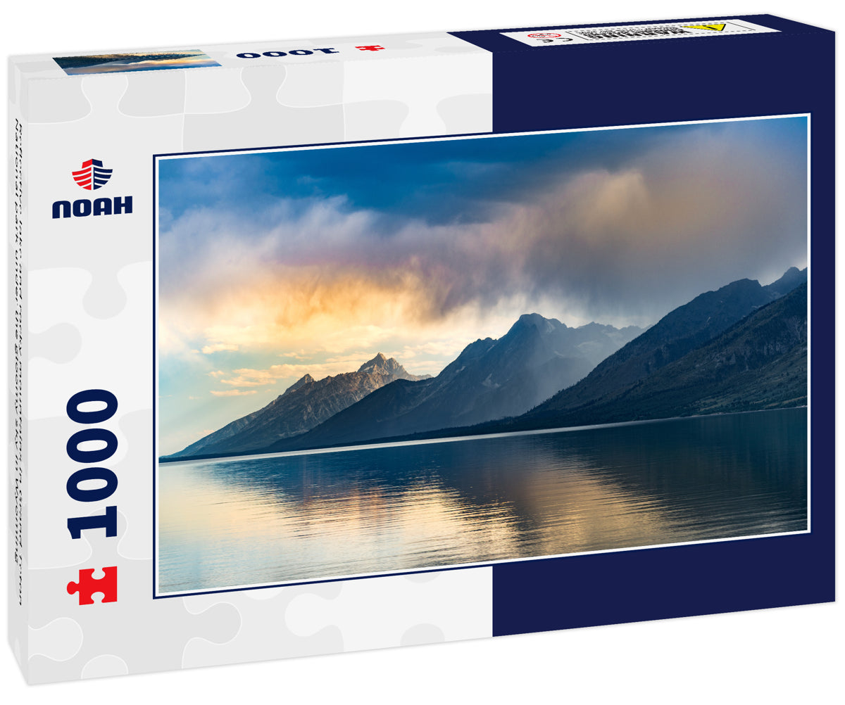 Reflective lake and rocky mountains in Grand Teton National park under the gloomy sky in Wyoming