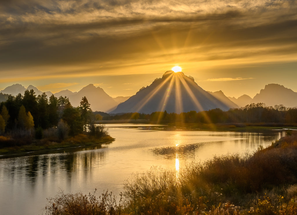 Sun atop of the mountain at Oxbow Bend in Grand Teton National Park, Wyoming