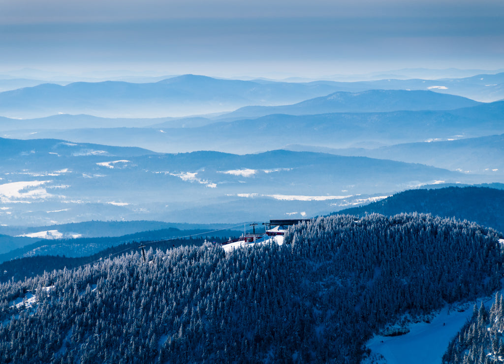 Panoramic view overlooking ski chairlift in winter, Stowe, Vermont, USA