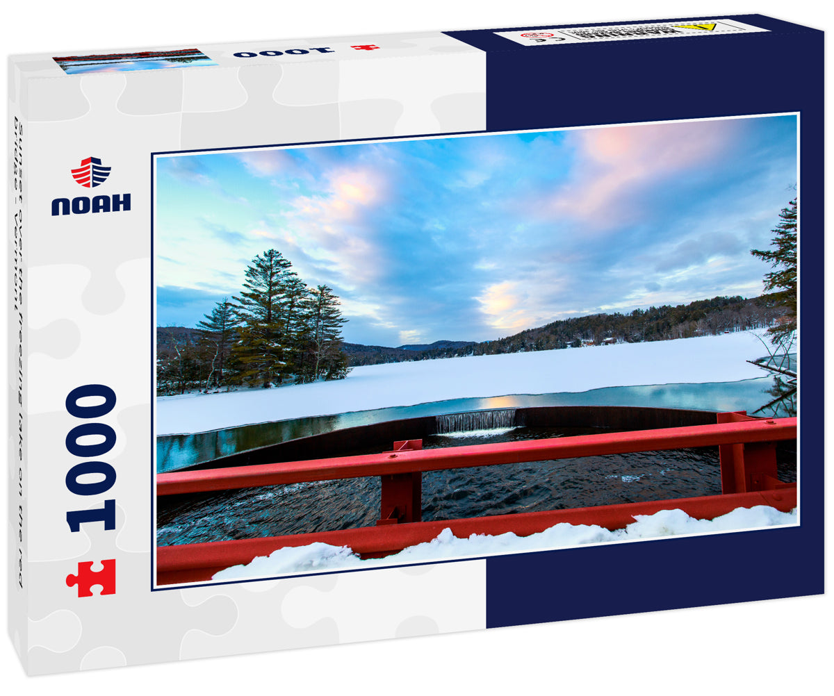 Sunset over the freezing lake on the red bridge - Vermont