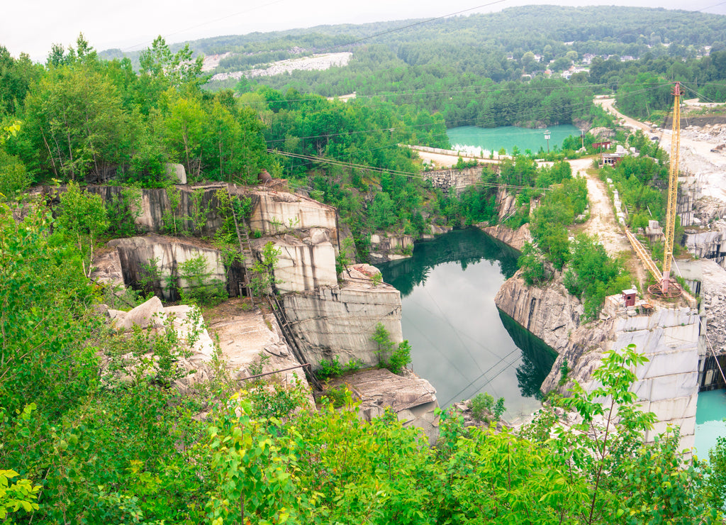 View of the Barre, Vermont country side in a granite quarry landscape of active and retired quarries