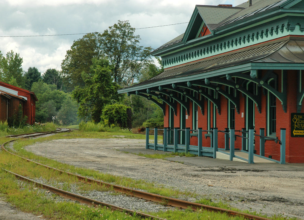 Old Train station in Vermont with overgrown tracks